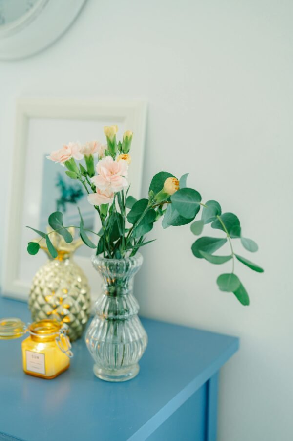 pexels-larissafarber-17846661 Artistic Face Vase with Greenery